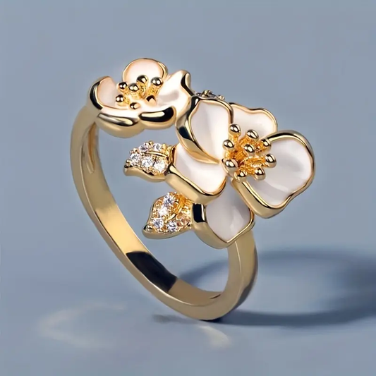 Gold Ring with White Blossom Design
