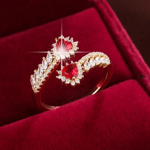 Gold Ring with Open Design and Red Zirconia