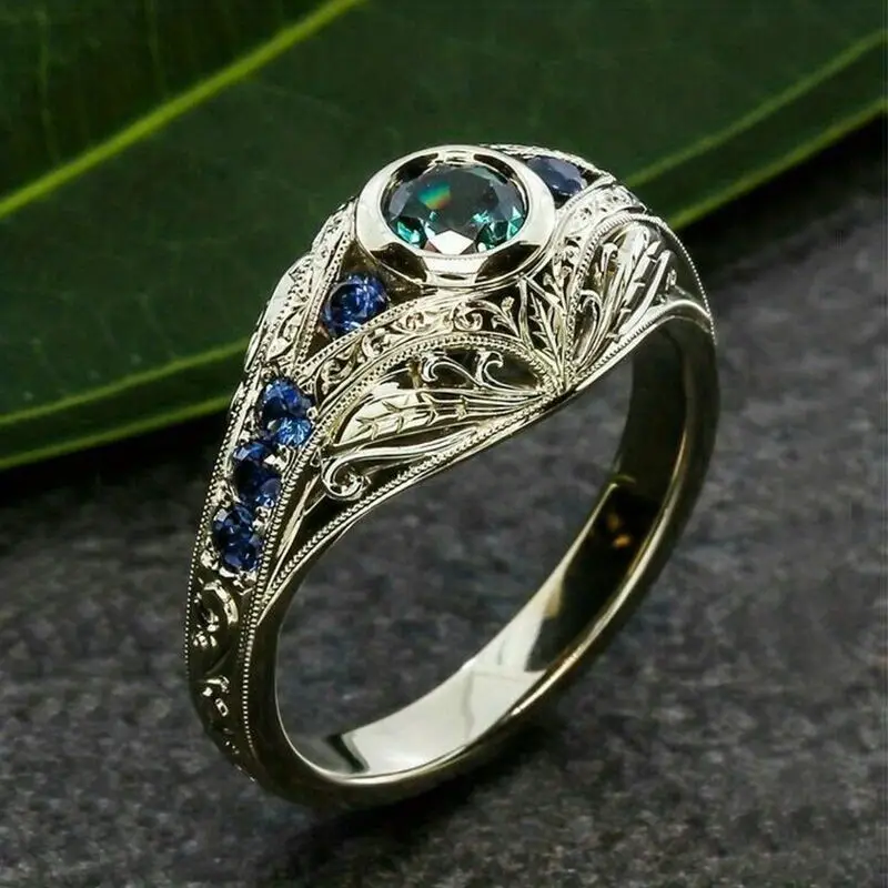 Silver Ring with Blue Hollow Design