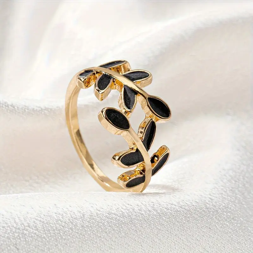 Elegant Gold Ring with Black Leaf Design