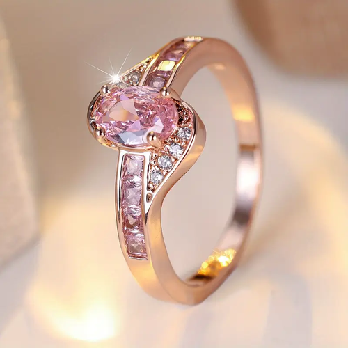 Gold Ring with Pink Crystal Accent