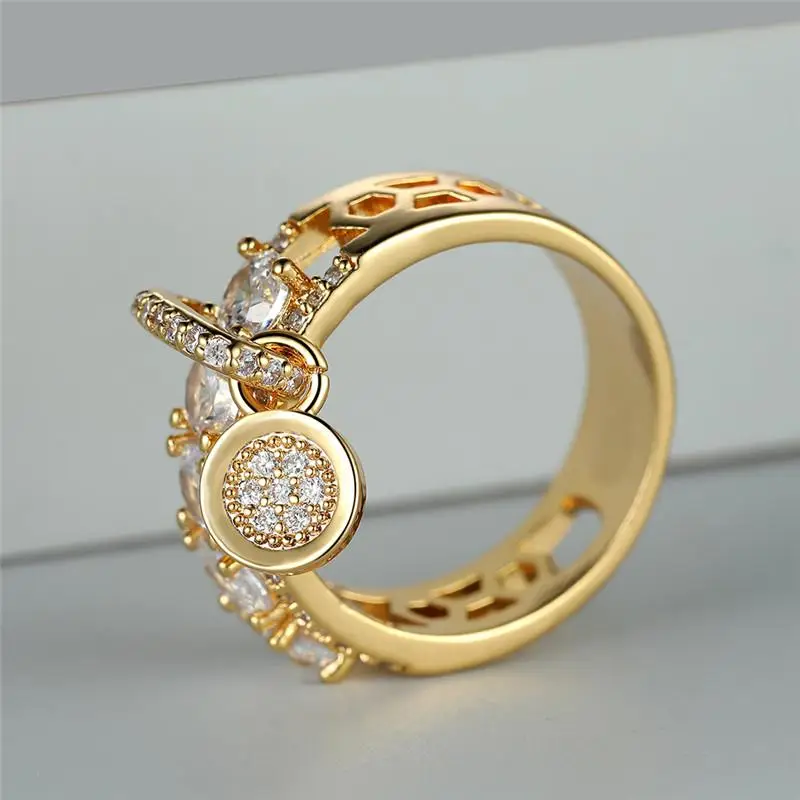 Elegant Hollow Ring with Golden Charms