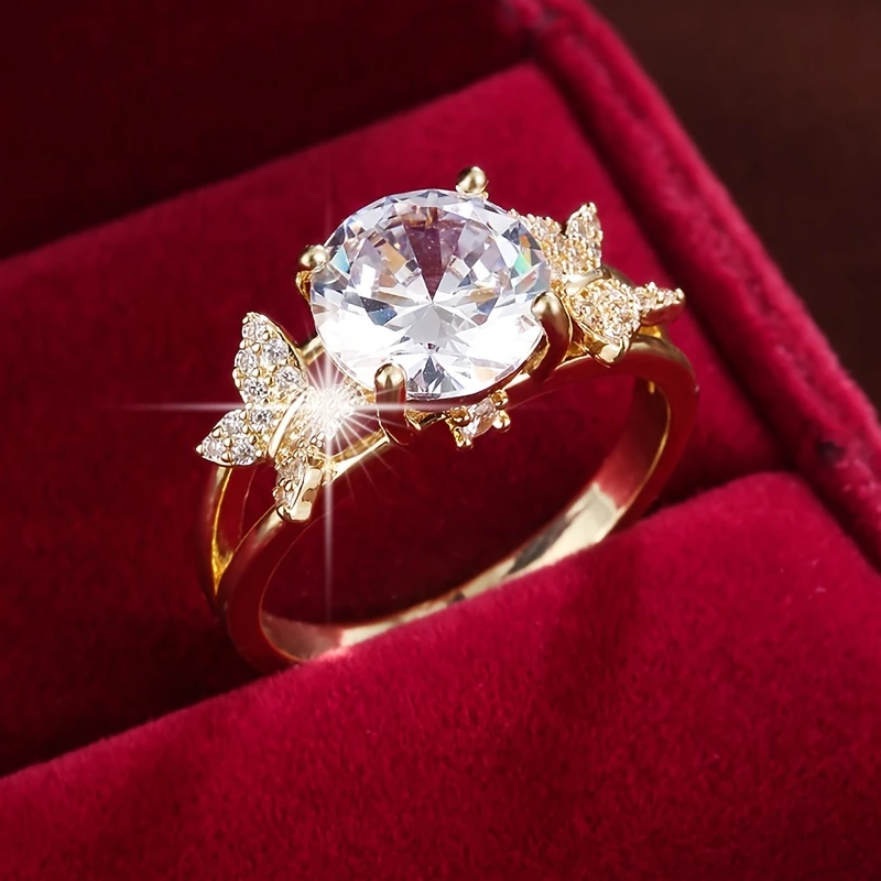 Gold Ring with Crystal Butterfly Design