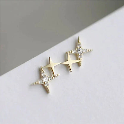 Gold Star Earrings Adorned with Zirconia